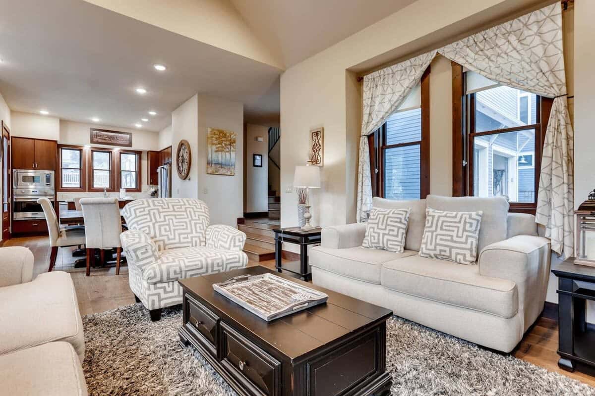 Family room sharing an open concept with the kitchen and dining table